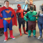 people dressed as superheroes for charity event