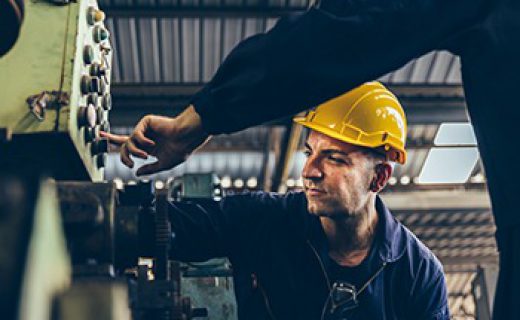 Group of Industrial factory maintenance engineers inspect relay protection system of machinery with copy space for your text. Industry, Maintenance, Engineering and construction concept.